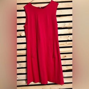 Fuschia strechy dress with pockets size L as new